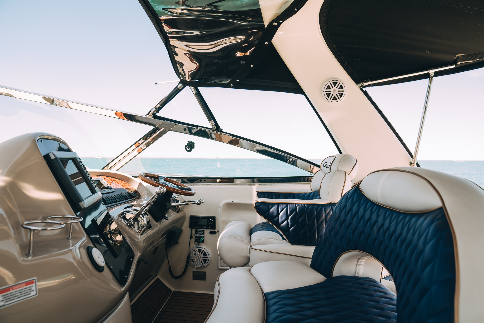 Captain's helm with full instrumentation and navy quilted seating